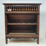 An early 20th century oak miniature bookcase, 41 cm wide and a 19th C cartridge maker (2)