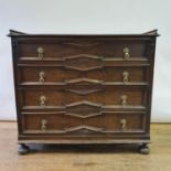 An oak chest, of four drawers, 106 cm wide