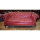 A red leather upholstered Chesterfield sofa, 190 cm wide Report by RB Deceased estate, from a very