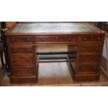 A 19th century mahogany pedestal desk, with leather inset top, with nine drawers, 135 cm wide