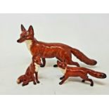 A Beswick Fox, 1016A, a fox seated, 1748, and a fox standing, 1440 (3)