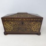 A Regency rosewood and brass inlaid tea caddy, sarcophagus form, hinge lid to reveal two