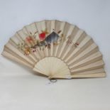 An early 20th century embroidered ivory cased fan, 35 cm, and an altar screen (2)