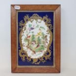 A 19th century Sevres style porcelain plaque, central cartouche, decorated with landscape and exotic