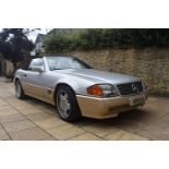 A 1992 Mercedes-Benz 500 SL Registration number K89 EUL V5C Brilliant silver with a black leather