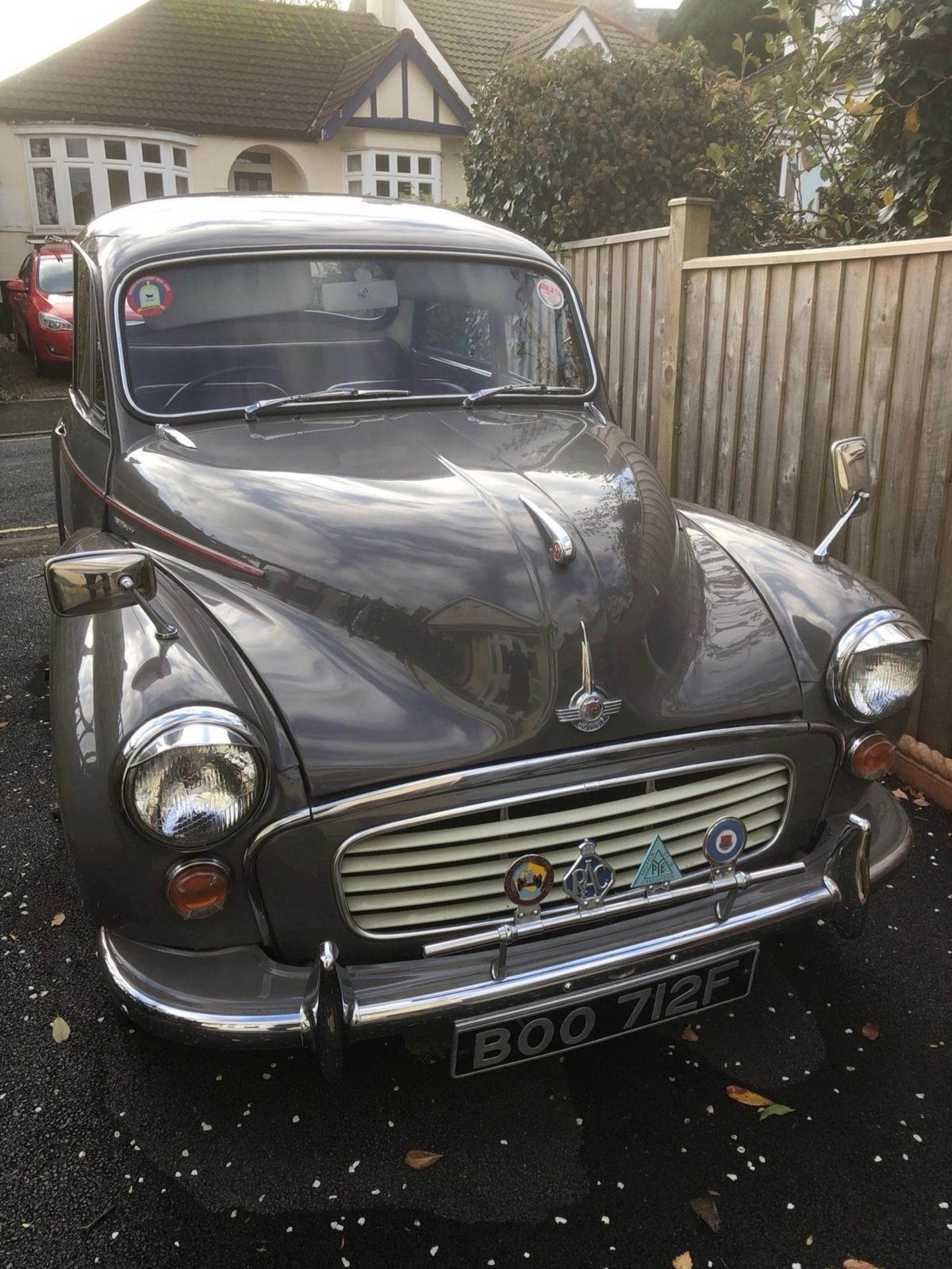 A 1968 Morris Minor 1000 Registration number BOO 712F Rose Taupe with a red interior