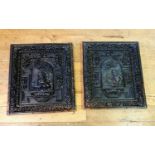 A pair of Flemish carved oak panels, with central domed cartouche carved a cherub and a swan, and