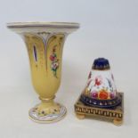 A 19th century yellow ground vase, decorated with flowers, highlighted in gilt, 15 cm high, and a