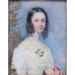 A 19th century portrait miniature, of a young lady with a flower on her dress, 8 x 7 cm