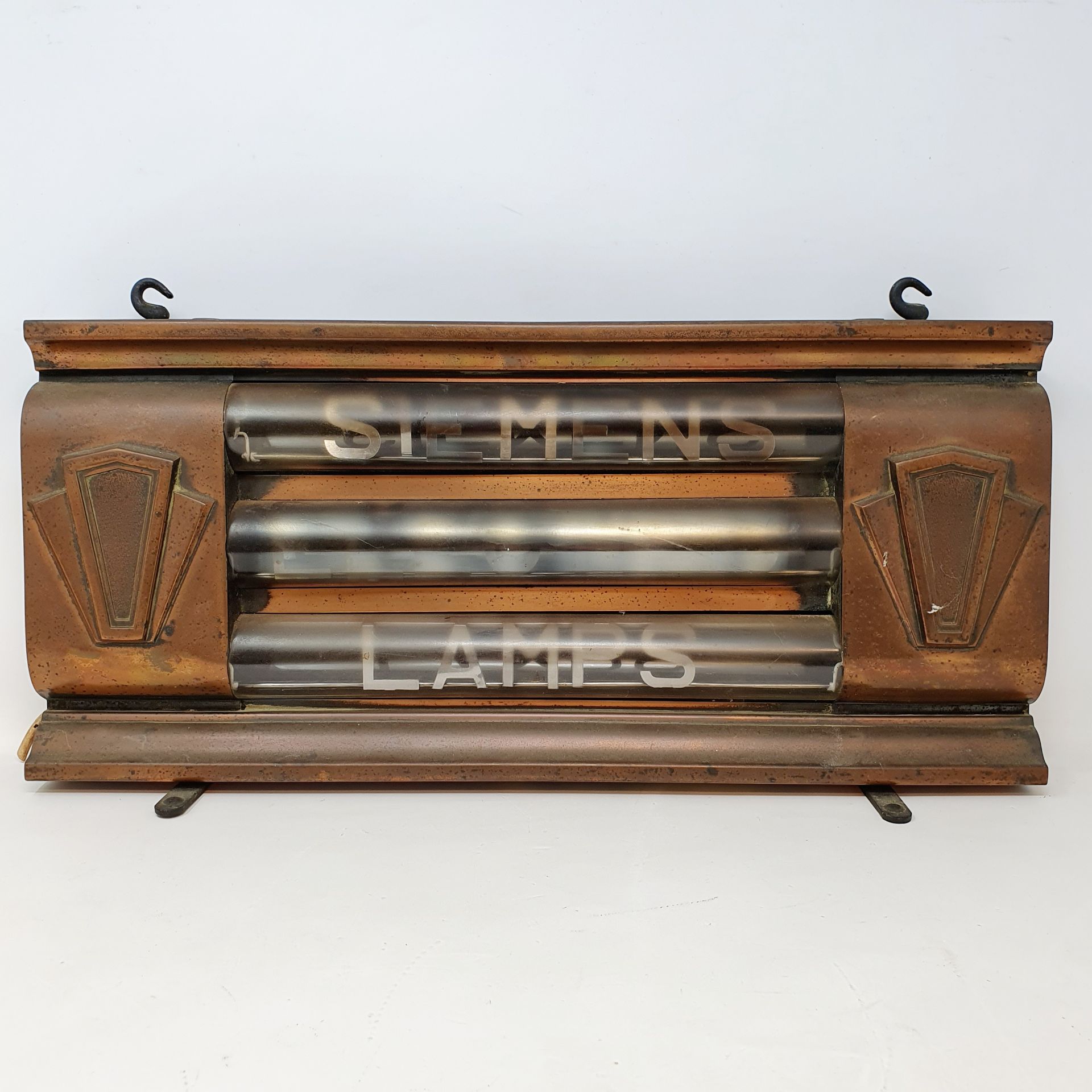 A SIEMENS ELECTRIC LAMPS showroom light type box, in an anodised copper case, probably 1920's with