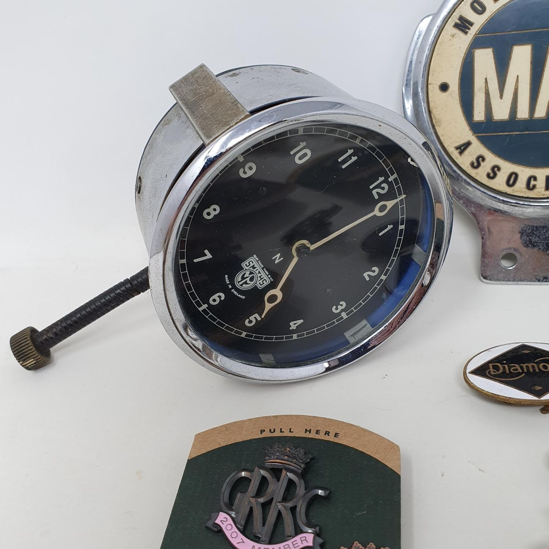 A Smiths dashboard clock, with Arabic numerals and a black dial, a Motor Agents Association car - Image 3 of 3