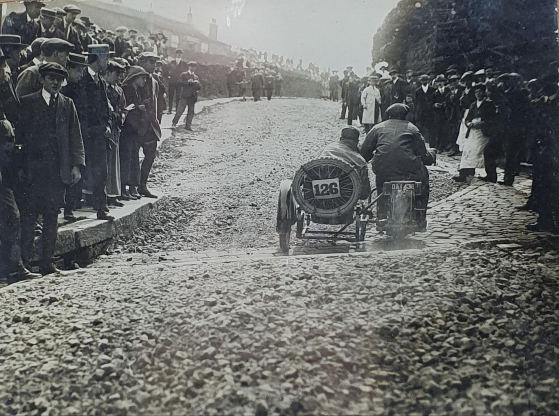 A monochrome photograph, of a motorcycle and side car, possibly the Coleman Cup 1922, 15.5 x 21 cm - Image 2 of 2