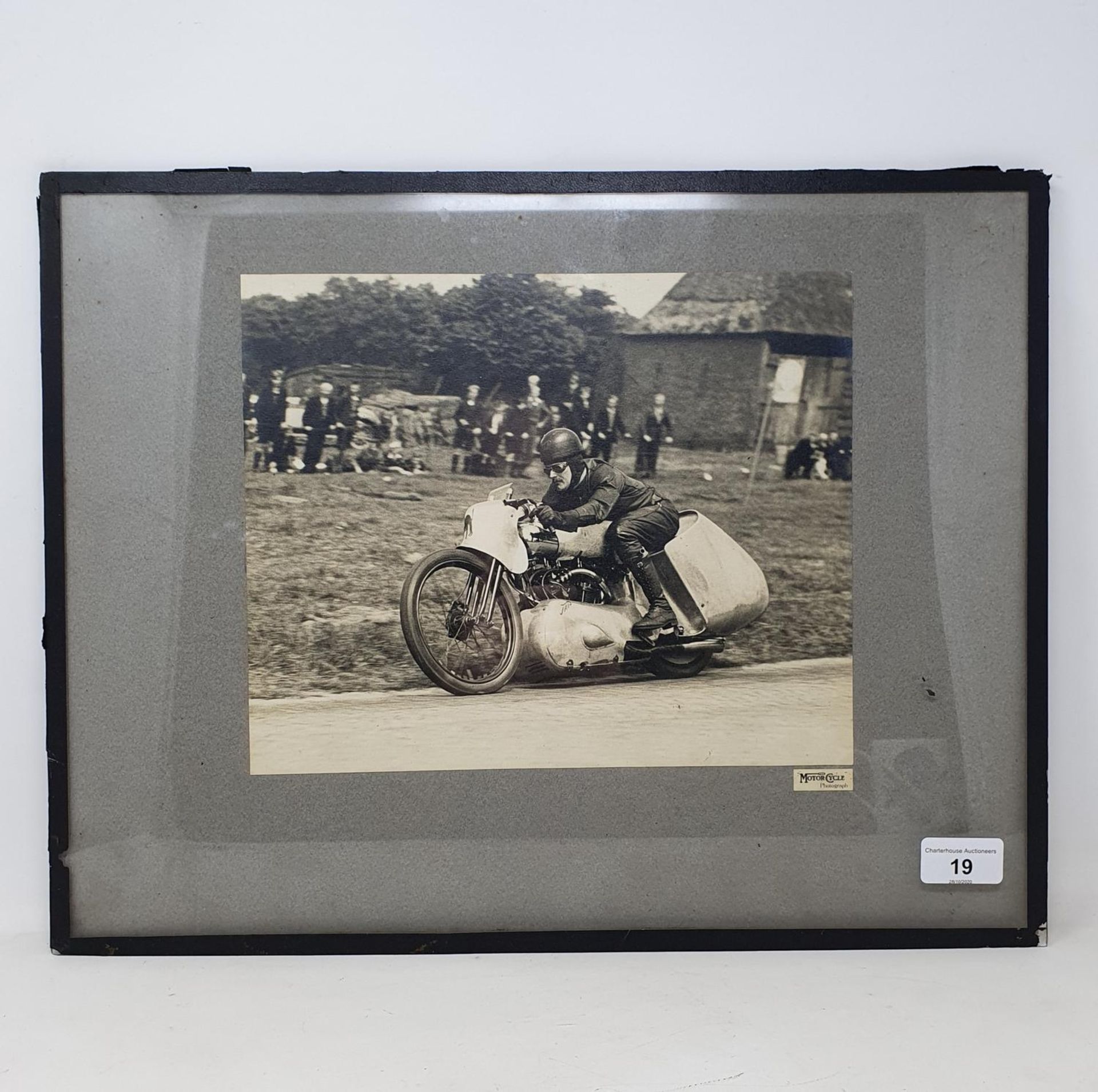 A Motor Cycle monochrome photograph of Eric Fernihough, on his Brough, 23 x 28 cm Provenance: