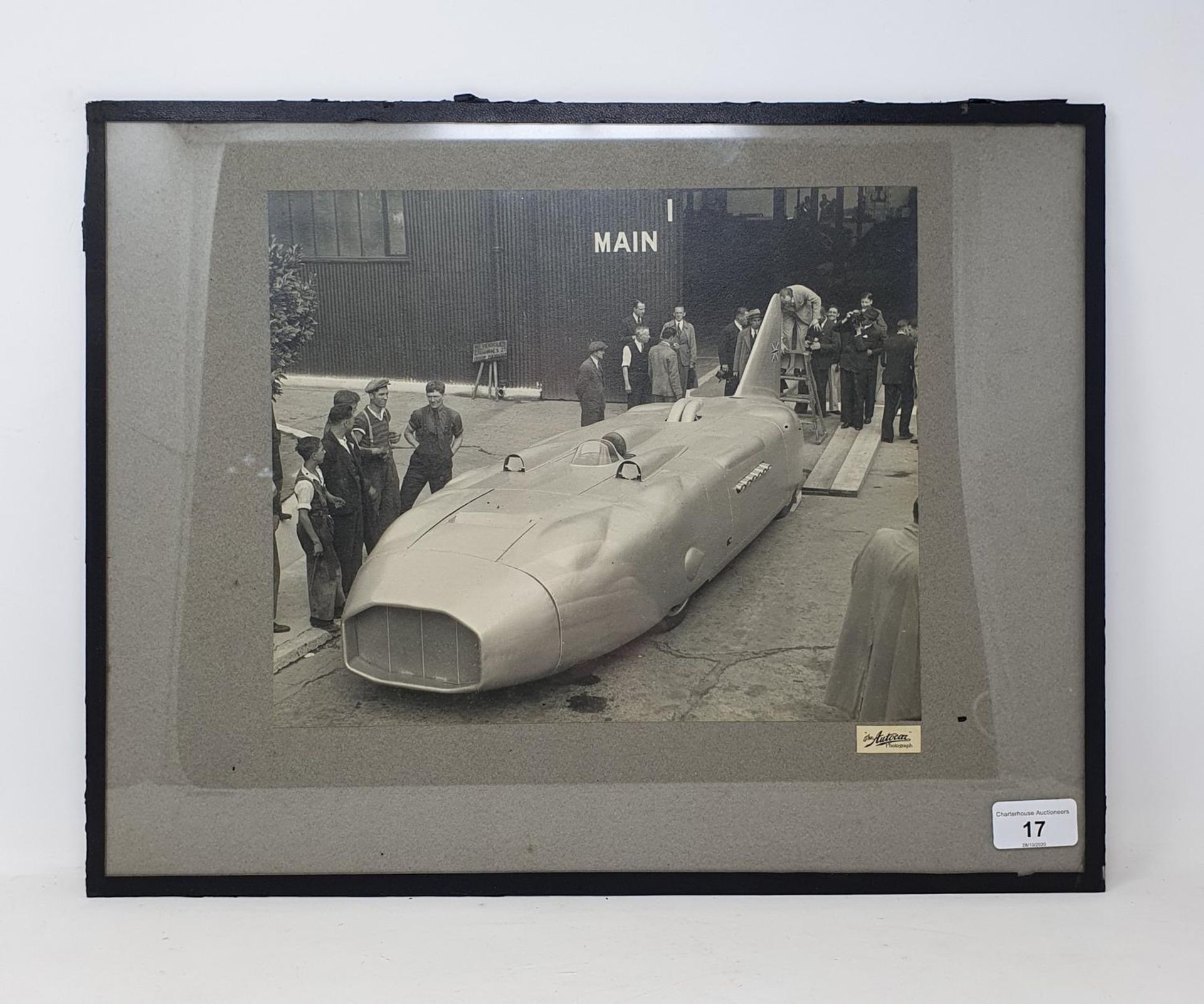 An Autocar monochrome photograph, Thunderbolt land speed record car driven by George Eyston, 24 x 29