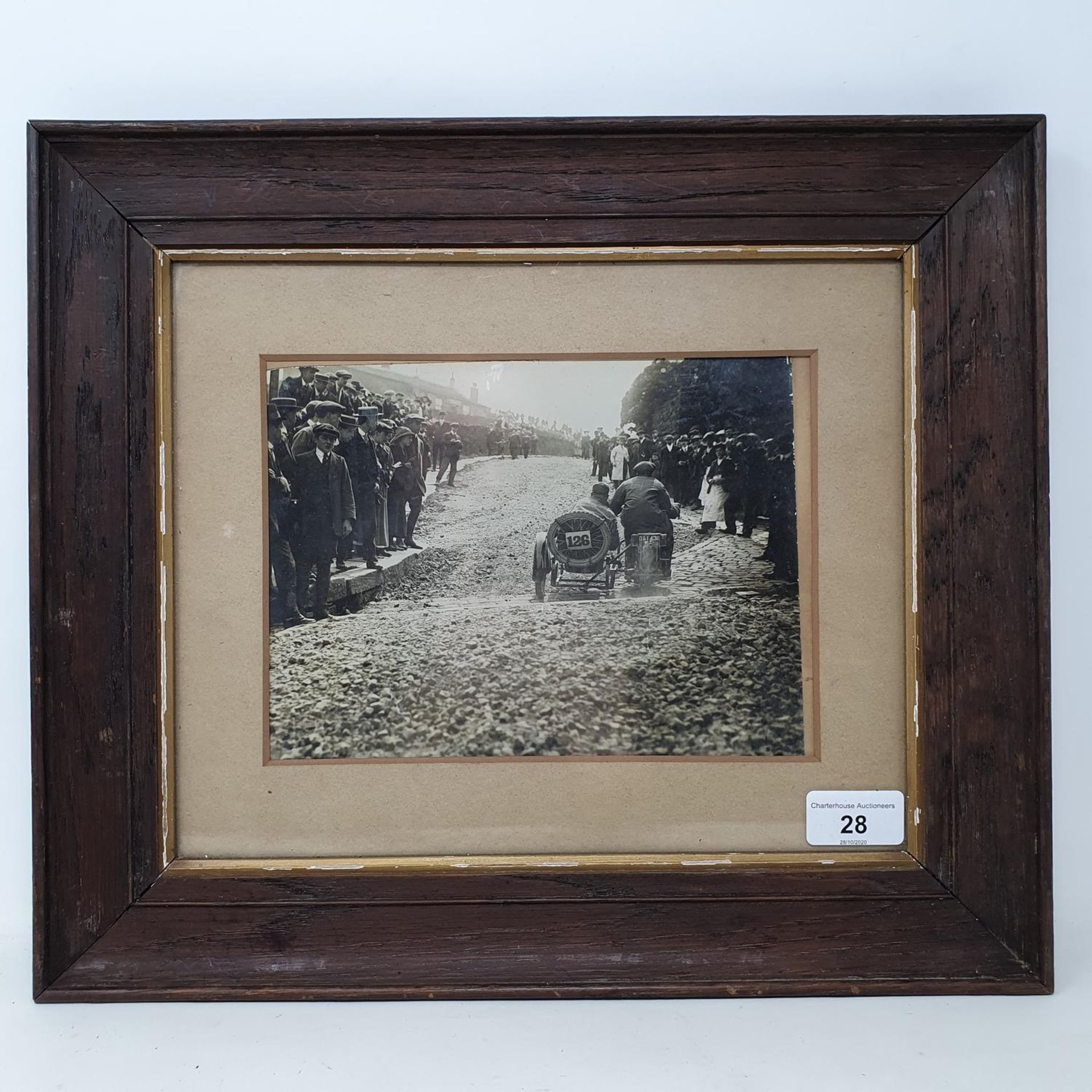 A monochrome photograph, of a motorcycle and side car, possibly the Coleman Cup 1922, 15.5 x 21 cm