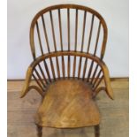 A 19th century elm Windsor chair Loss of colour, joints slight movement but strong JS
