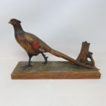A table lighter in the form of a pheasant, a pair of coaching lamps, a toy farmyard set, and other