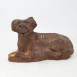 A Chinese Archaic style figure of a dog, 24 cm wide