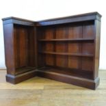 An early 20th century mahogany bookcase, 240 cm wide, and a matching corner bookcase, 140 cm wide (