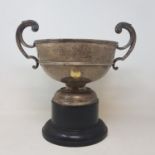 A silver two handle pedestal trophy bowl, inscribed and dated 1958, London 1930, 30.6 ozt, on a