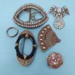 A Georgian paste set buckle, of navette form, a paste brooch, three other brooches and an eternity