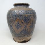 A Chinese earthenware vase, of inverted baluster form, decorated in underglaze blue and with a
