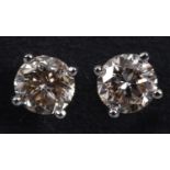 A pair of 18ct white gold and solitaire diamond studs Yes they are screw backs Diamonds are