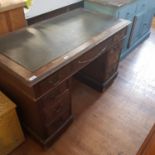 An oak pedestal desk, 124 cm wide, a painted coal box, a doll's pram, a footstool, and a modern