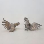 A pair of silver plated fighting cockerels, and various silver plate (2 boxes)