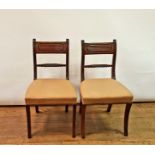 A set of ten 19th century mahogany bar back dining chairs, with padded seats,on reeded splayed