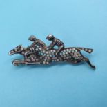 A 9ct gold, silver, diamond and opal jockey brooch