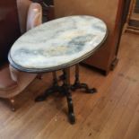 An oval marble top ebonised table, 93 cm wide, and a painted card table (2) Top 99 cm x 60 cm,