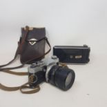 An Olympus OM-1 camera, other photography equipment and lenses (box)