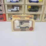 A Lledo Promotional model van, Epsom Stamp Co and 70 others Lledo vans, all boxed (box) Part of a