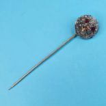 A yellow metal, diamond and ruby stick pin, in the form of a dog