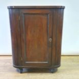 A 19th century mahogany cupboard, on turned legs, 74 cm wide