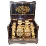 A late 19th century French liqueur box, inlaid with brass decorated grapes and vines, opening to