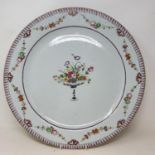 A Chinese famille rose charger, decorated flowers, 46 cm diameter No Chips cracks or repairs, some