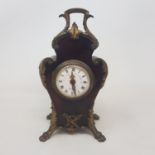 A Louis XVI style timepiece, the 5 cm diameter enamel dial signed Goldsmiths & Silversmiths, London,