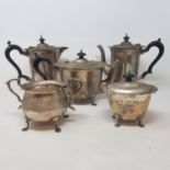 A silver five piece tea and coffee service, including a tea caddy, on pad feet, Birmingham 1904