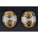 A pair of 18ct gold and diamond clip on earrings