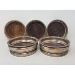 A pair of silver plated coasters, other coasters, and plated items including cutlery (qty)