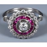 An Edwardian style platinum, ruby and diamond cluster ring, ring size M Report by JS Central old cut