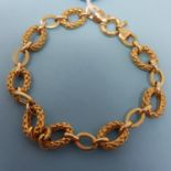 A 9ct gold fancy link bracelet, 9.9 g