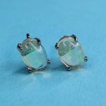 A pair of black Ethiopian opal and silver stud earrings