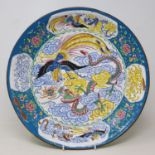 A Chinese enamel plate, decorated with phoenix, 36 cm diameter
