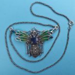 A modern silver coloured metal bee necklace, with enamel wings Report by JS Note: this is 20th/