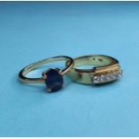 A 9ct gold and diamond ring, ring size M, and an 18ct gold and blue stone ring, ring size O (2)