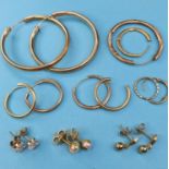 Assorted 9ct gold hoop earrings, 3.7 g, and various stud earrings