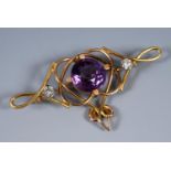 A 15ct gold, amethyst and diamond Art Nouveau style brooch RB All measurements are approx., 5.8 cm